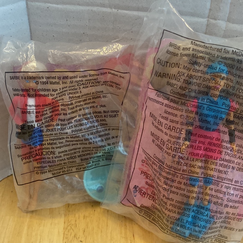 McDonalds happy meal set of 2 barbie toys cool skating and lifeguard Barbie.